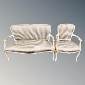 A French cream and gilt two seater settee with matching armchair