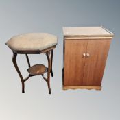 A mahogany double door low cabinet together with an Edwardian oak occasional table