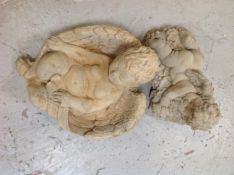 Two concrete cherub garden ornaments