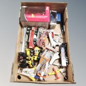 A box of die cast vehicles : Corgi, space shuttles, matchbox,