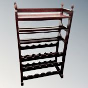 A wine rack in a mahogany finish