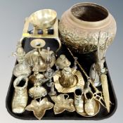 An embossed brass jardiniere, trivet stand, brass ornaments,
