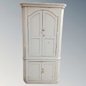 A Victorian pine double corner cabinet