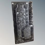 A Pearlite carved ebonised cribbage board