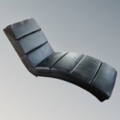 A black leather chaise longue (a/f) CONDITION REPORT: Leather somewhat distrsssed.