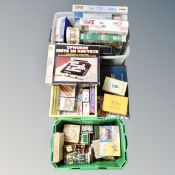 Three boxes of assorted board games, jigsaws,