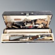 A vintage wooden joiner's tool box of hand tools