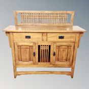 An oak Arts & Crafts style sideboard