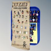 A group of Robertson's band figures and similar lapel pins,