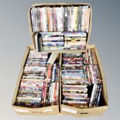 Three boxes of approximately 150 DVDs,