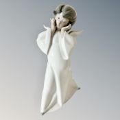 A Lladro figure of an angel