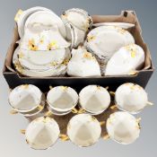 An extensive Crown Ducal Sunburst dinner service