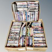 Three boxes of approximately 150 DVDs,