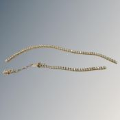 A 9ct yellow gold bracelet set with zirconia, 6.2g gross.