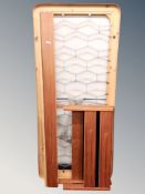 A 20th century teak 3' bed frame and a further 3' bed base