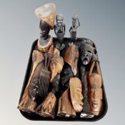 A tray of African carvings, figures,