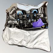 A Norauto car mounted bike rack in a zipped bag