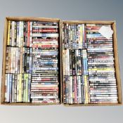 Two boxes containing approximately 150 DVD's