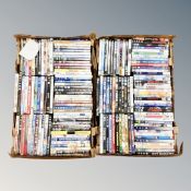 Two boxes containing approximately 150 DVD's