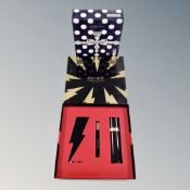 A Carolina Herrera Bad Boy three-piece eau de toilette and deodorant gift set and a Gillette gift