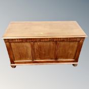 An oak blanket box,