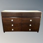 A contemporary high gloss sideboard fitted with eight drawers,