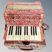 An Alvari piano accordion in case