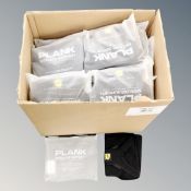 A box of 50 Plank adjustable shoulder braces,
