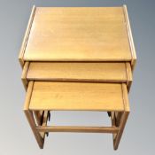 A teak nest of three tables