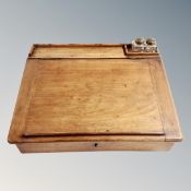 A Victorian clerk's writing slope with glass inkwells