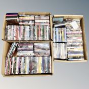 Three boxes containing approximately 150 DVD's