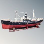 A painted metal model of the trawler Great Hope, on stand,