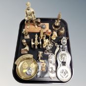 A tray of assorted brass ornaments, horse brasses, St John's Ambulance medal,