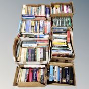 A pallet of seven boxes of mainly hardbacked books, biographical dictionaries, reference,