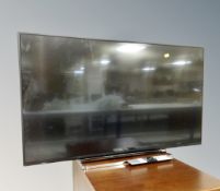 A Toshiba model 43 VL 5A 63DB LCD Smart TV with remote