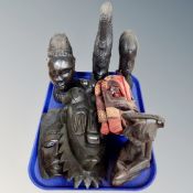 A tray of African carvings, figures,