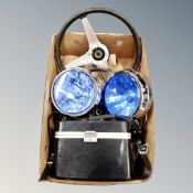 A box of two vintage steering wheels,