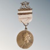 A 1914 East Lincolnshire musical competition medal on ribbon