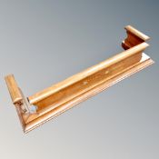 A late Victorian inlaid mahogany fire curb