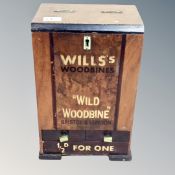A 1930s counter topped cabinet bearing Wills Woodbine Advertisement