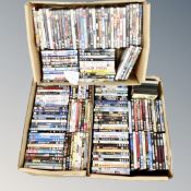 Three boxes containing approximately 150 DVD's