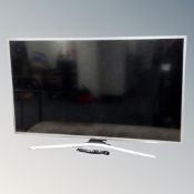 A Samsung Model UE50JU6800K LCD smart TV with lead and remote