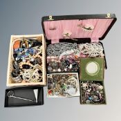 A box of mixed costume jewellery, pearls, boxed candle snuffer,
