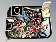 A 9ct yellow gold citrine heart shaped pendant together with a quantity of costume jewellery,