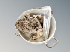 An aluminium jam pan containing a piece of drift wood and a thermometer