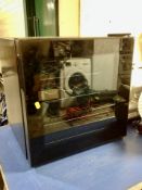 A Delonghi coffee machine together with a bottle fridge