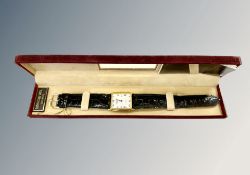 A lady's 18ct gold plated Raymond Weil quartz calendar wristwatch, boxed.