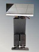 A Sony home theatre system with remote and speakers