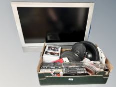 A Goodmans TV and a box containing DVD's, speakers,