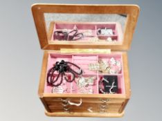 Two boxes containing costume jewellery, little book of earrings,